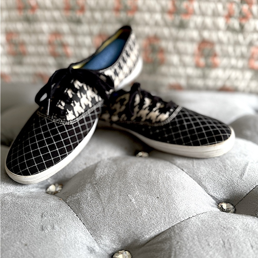 Women’s black and white Keds that would add style to your black outfit.